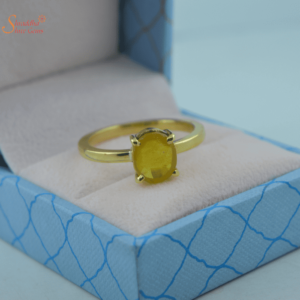 gold and silver yellow sapphire ring