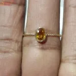 yellow sapphire gemstone ring in panchdhatu