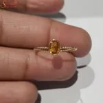 yellow sapphire gemstone ring in panchdhatu