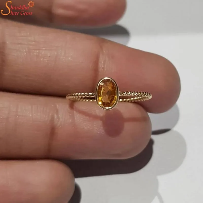 yellow sapphire gemstone ring in panchdhatu