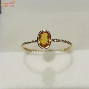 yellow sapphire gemstone ring in panchdhatu