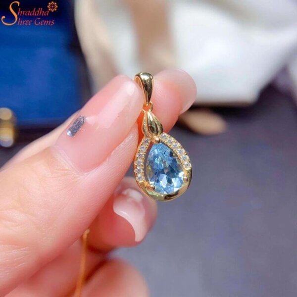 blue topaz pendant with moissanite diamond