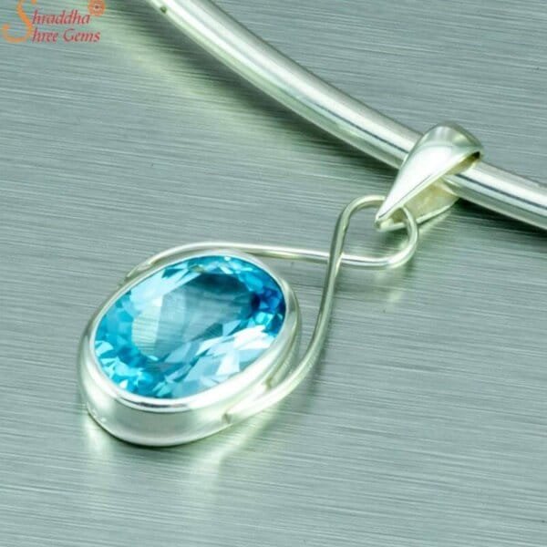 oval cut blue topaz pendant