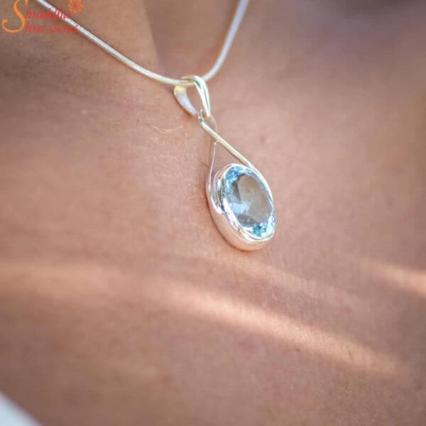 oval cut blue topaz pendant