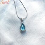 pear shape blue topaz pendant
