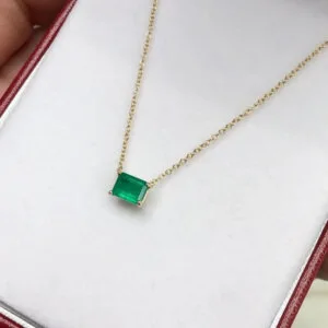 medium dark green emerald pendant