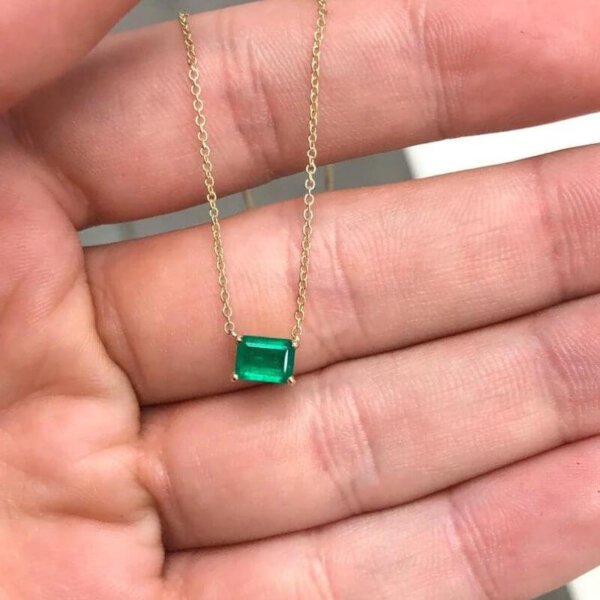 medium dark green emerald pendant