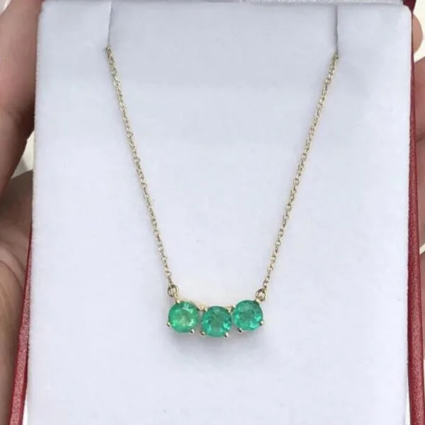 three emerald gemstone pendant