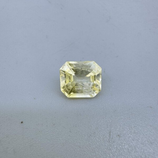 4.03 carat natural yellow sapphire pukhraj gemstone 4.47 ratti – certified lightweight Ceylon yellow stone for daily astrological wear on white background.