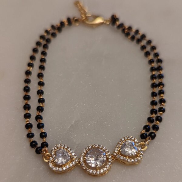 Triple Motif CVD Diamond Gold Mangalsutra Bracelet