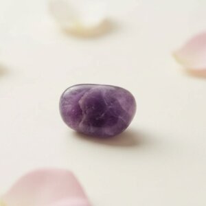 Natural amethyst tumble stone polished purple healing crystal in multiple angles front side top view