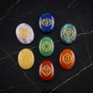 7 Chakra Zibu Coin featuring engraved Zibu symbols with colorful chakra stones in a spiritual design.