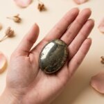 Natural pyrite crystal palm stone polished metallic gold stone shown in front, side, top and angled views
