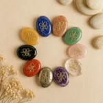 Zibu Coin featuring engraved sacred Zibu symbols on a polished crystal surface.