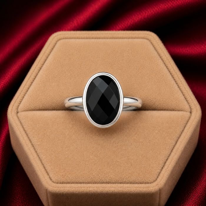 Black Onyx Ring featuring a deep black onyx gemstone set in an elegant polished ring design with bold sophisticated detailing.