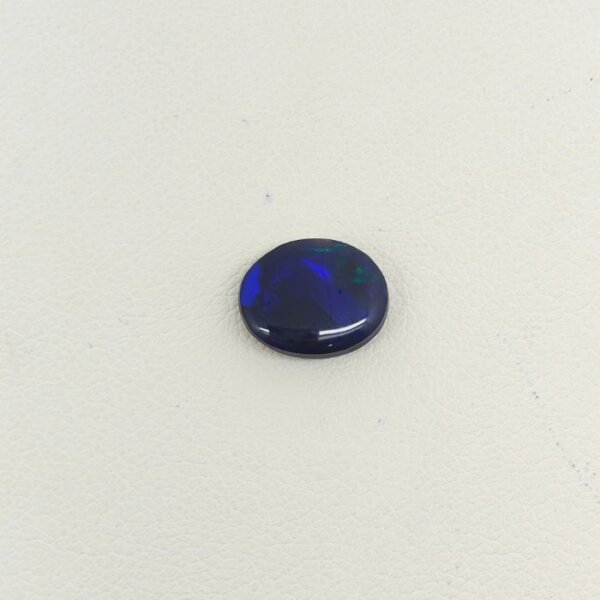 Buy Natural Black Opal Gemstone featuring mesmerizing multicolor play-of-color, deep dark body tone, and exceptional natural brilliance.