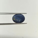 Black Opal BOP-003 showcases mesmerizing flashes of color, exceptional rarity, and timeless gemstone elegance. Its vibrant play-of-color displays brilliant blue, green, red, and orange hues against a rich dark background, making it a luxurious choice for collectors, fine jewellery, and gemstone enthusiasts.