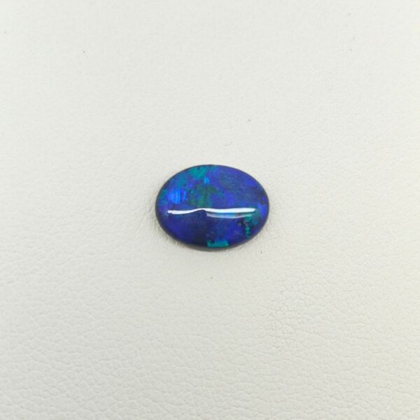 Black Opal BOP-003 featuring mesmerizing multicolor flashes, deep dark body tone, and exceptional natural brilliance.