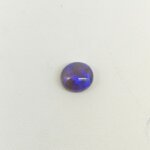 Natural Black Opal gemstone featuring vibrant multicolor play-of-color, deep dark body tone, and exceptional natural brilliance.