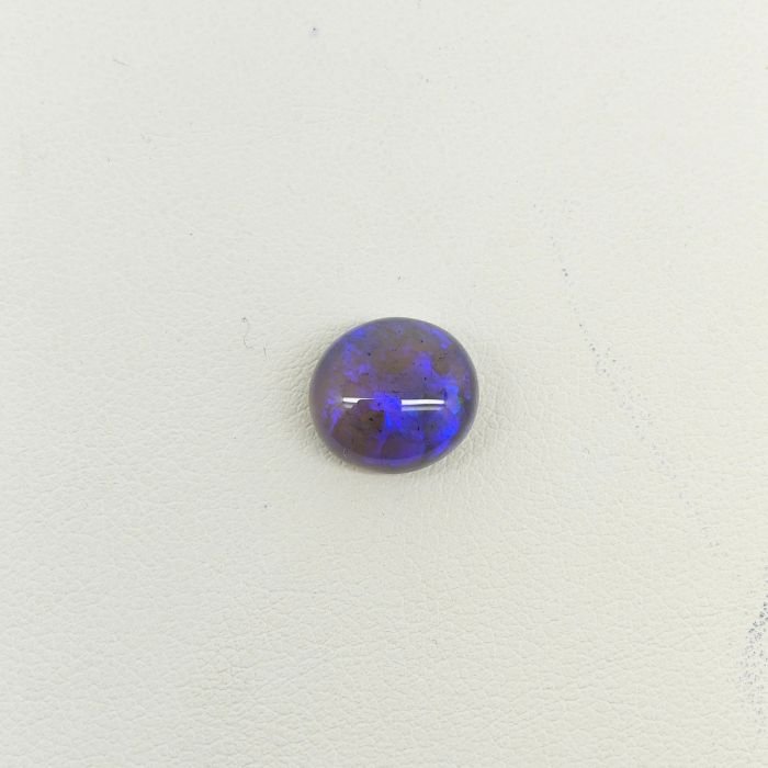 Black Opal BOP-004 Natural Black Opal gemstone featuring vibrant multicolor play-of-color, deep dark body tone, and exceptional natural brilliance.