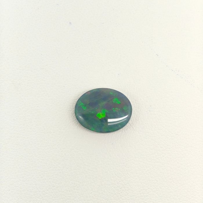 Black Opal BOP-006 Natural Black Opal gemstone featuring vivid multicolor play-of-color, deep dark body tone, and exceptional natural brilliance.