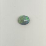 Black Opal BOP-010 featuring vibrant multicolor flashes, deep dark body tone, and exceptional natural brilliance.
