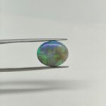 Buy Australian Black Opal BOP-010 with stunning rainbow play-of-color. Certified natural opal gemstone perfect for custom jewelry, collectors, and gemstone investments.
