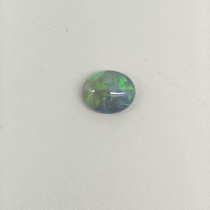 Black Opal BOP-010 Black Opal BOP-010 featuring vibrant multicolor flashes, deep dark body tone, and exceptional natural brilliance.