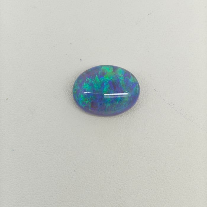Black Opal BOP-011 Black Opal BOP-011 featuring vibrant multicolor flashes, deep dark body tone, and exceptional natural brilliance.