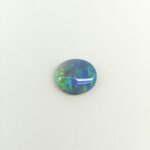 Natural Black Opal BOP-014 displaying intense rainbow flashes across a deep dark body tone with exceptional natural brilliance and rarity.