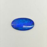 Black Opal BOP-015 featuring vibrant rainbow flashes, deep black body tone, and exceptional natural gemstone brilliance.