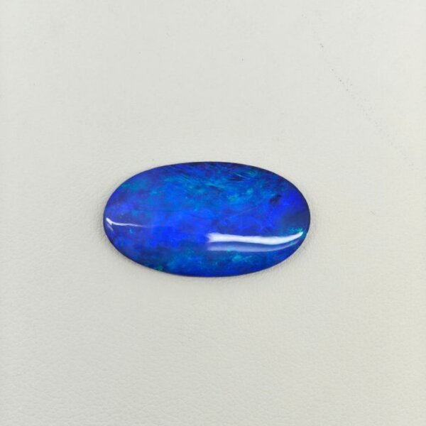 Black Opal BOP-015 featuring vibrant rainbow flashes, deep black body tone, and exceptional natural gemstone brilliance.