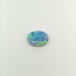 lack Opal BOP-016 featuring vibrant rainbow flashes, deep black body tone, and exceptional natural gemstone brilliance.