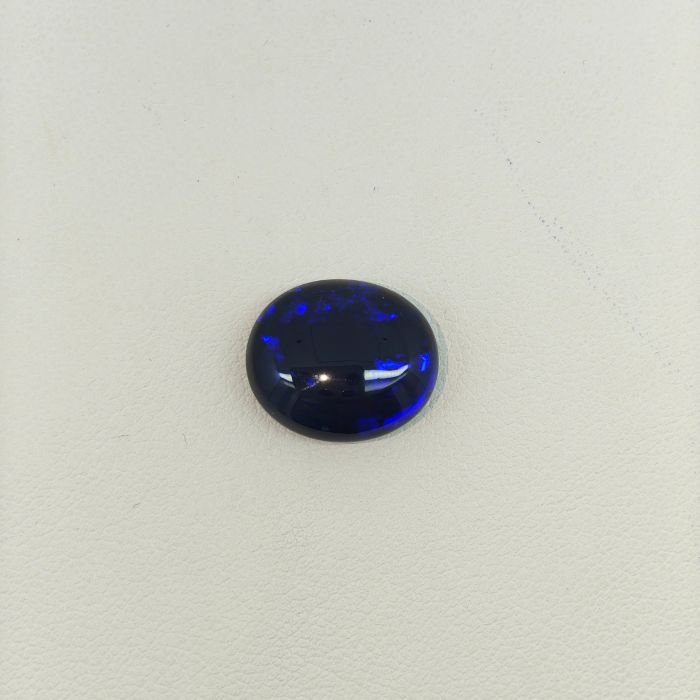 Black Opal BOP-017 Black Opal BOP-017 featuring dazzling rainbow flashes, deep black body color, and exceptional natural gemstone brilliance.