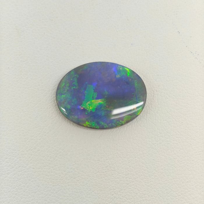 Black Opal BOP-020 Black Opal BOP-020 featuring brilliant rainbow play-of-color, deep black body tone, and exceptional natural gemstone brilliance.