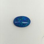 Black Opal BOP-021 featuring vivid rainbow flashes, deep black body color, and extraordinary natural gemstone brilliance.
