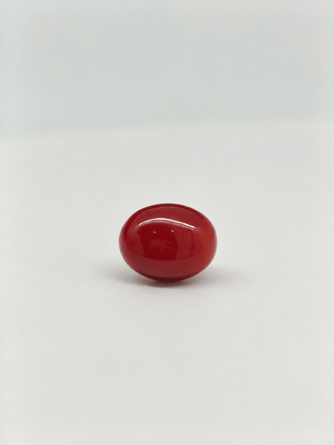 Natural Japanese Coral red to orange oval gemstone JCR-014 from Japan