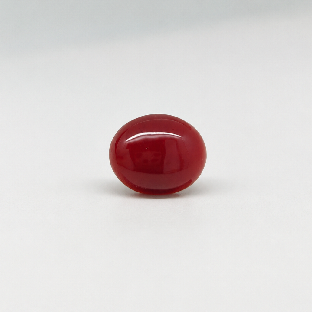 Natural Japanese Coral red to orange oval gemstone JCR-015 from Japan