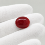 Natural Japanese Coral red to orange oval gemstone JCR-015 from Japan