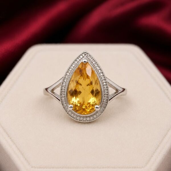Citrine Ring featuring a vibrant golden-yellow citrine gemstone set in an elegant polished ring design with radiant natural brilliance.