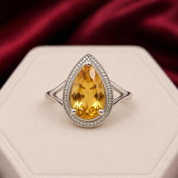 Citrine Ring featuring a vibrant golden-yellow citrine gemstone set in an elegant polished ring design with radiant natural brilliance.
