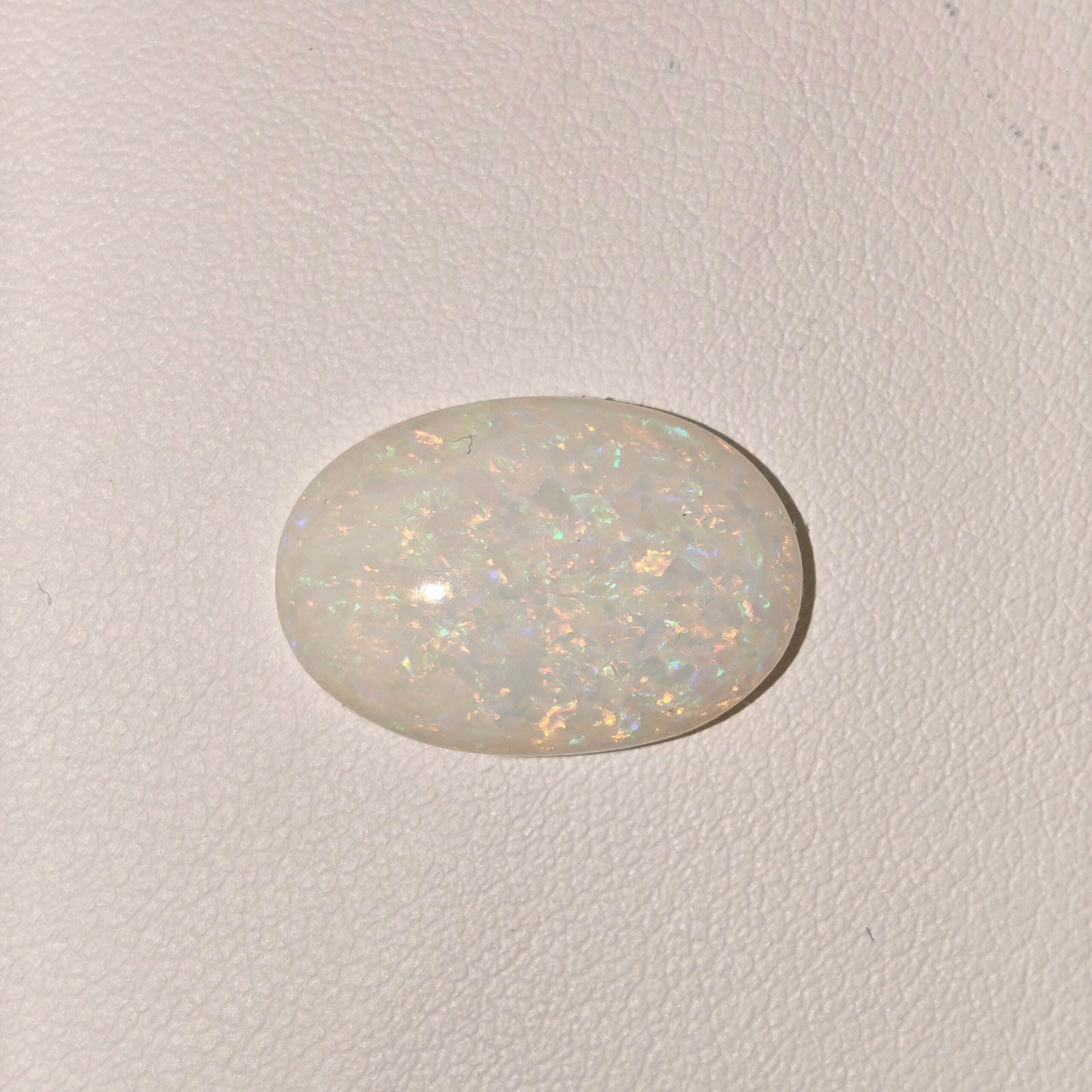 Natural Fire Opal White Oval Cabochon OP-004 Natural Fire Opal white oval cabochon gemstone OP-004 from Australia
