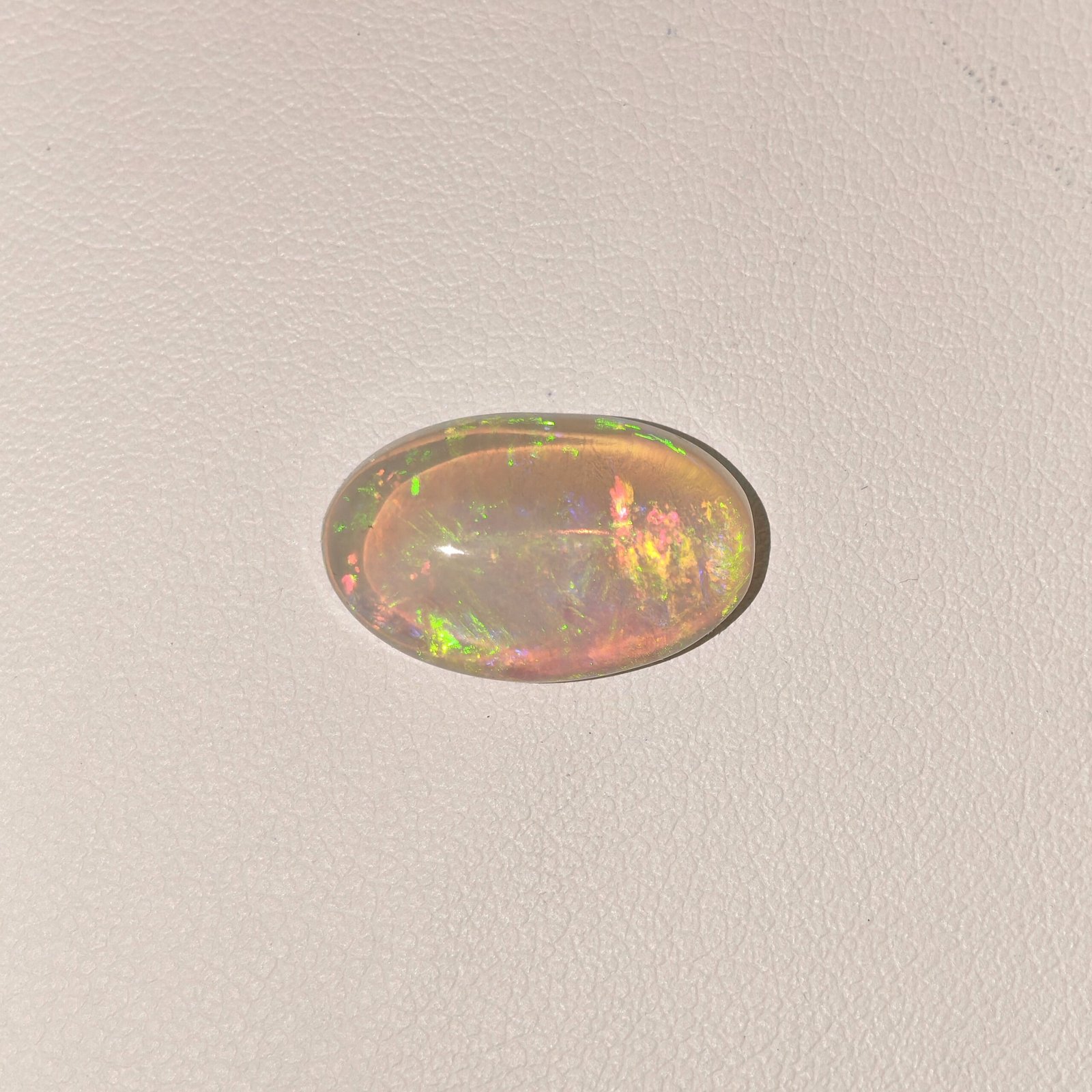 Natural Fire Opal White Oval Cabochon OP-005 Natural Fire Opal white oval cabochon gemstone OP-005 from Australia