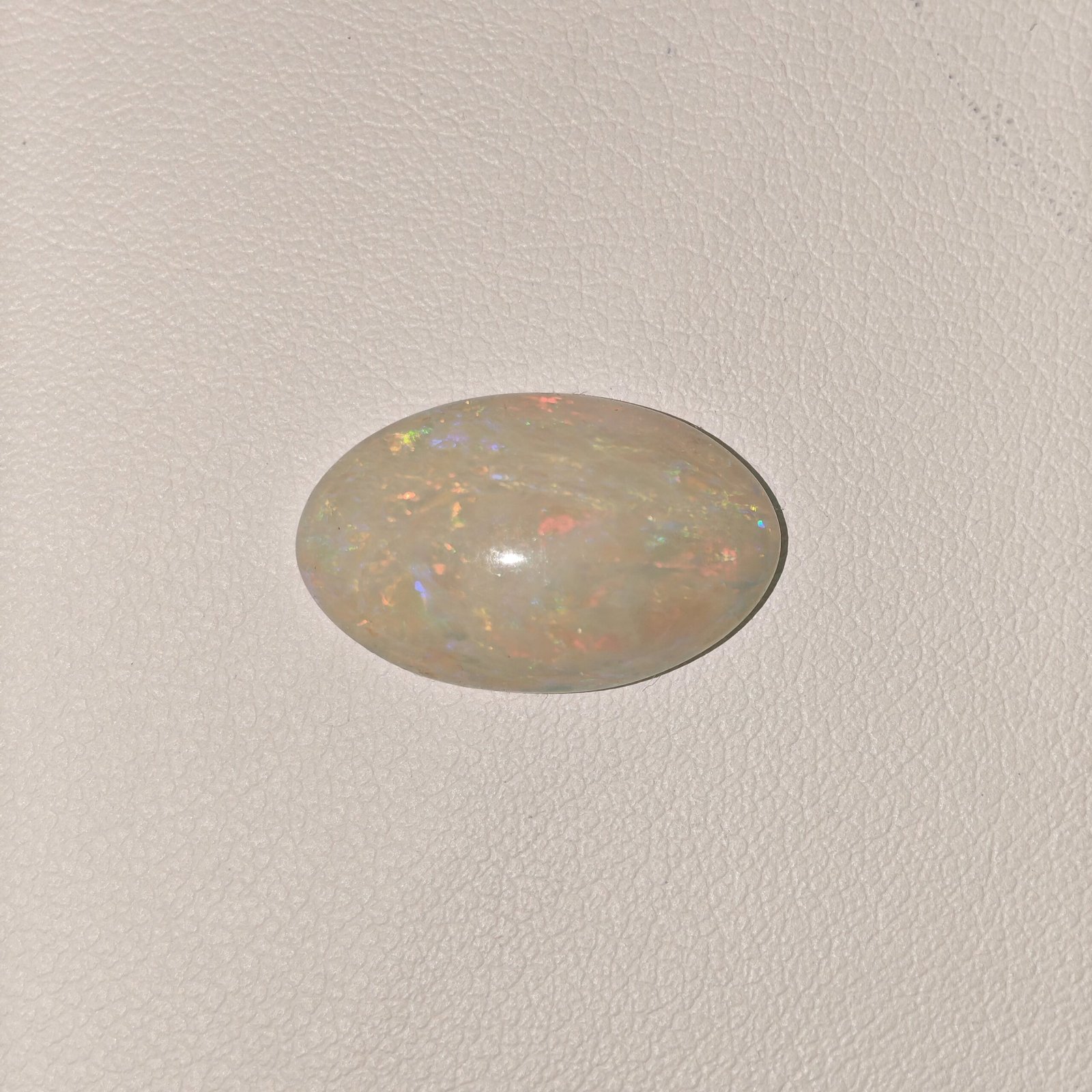 Natural Australian Fire Opal White Oval Cabochon OP-009 Natural Australian Fire Opal white oval cabochon gemstone OP-009 from Australia