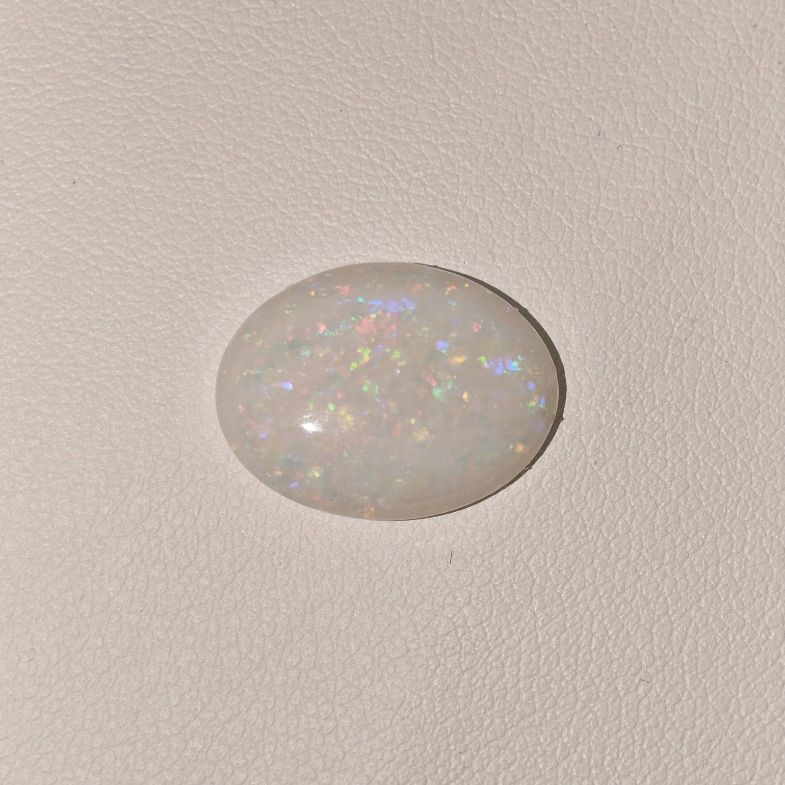Natural Australian Fire Opal White Oval Cabochon OP-011 Natural Australian Fire Opal white oval cabochon gemstone OP-011 from Australia