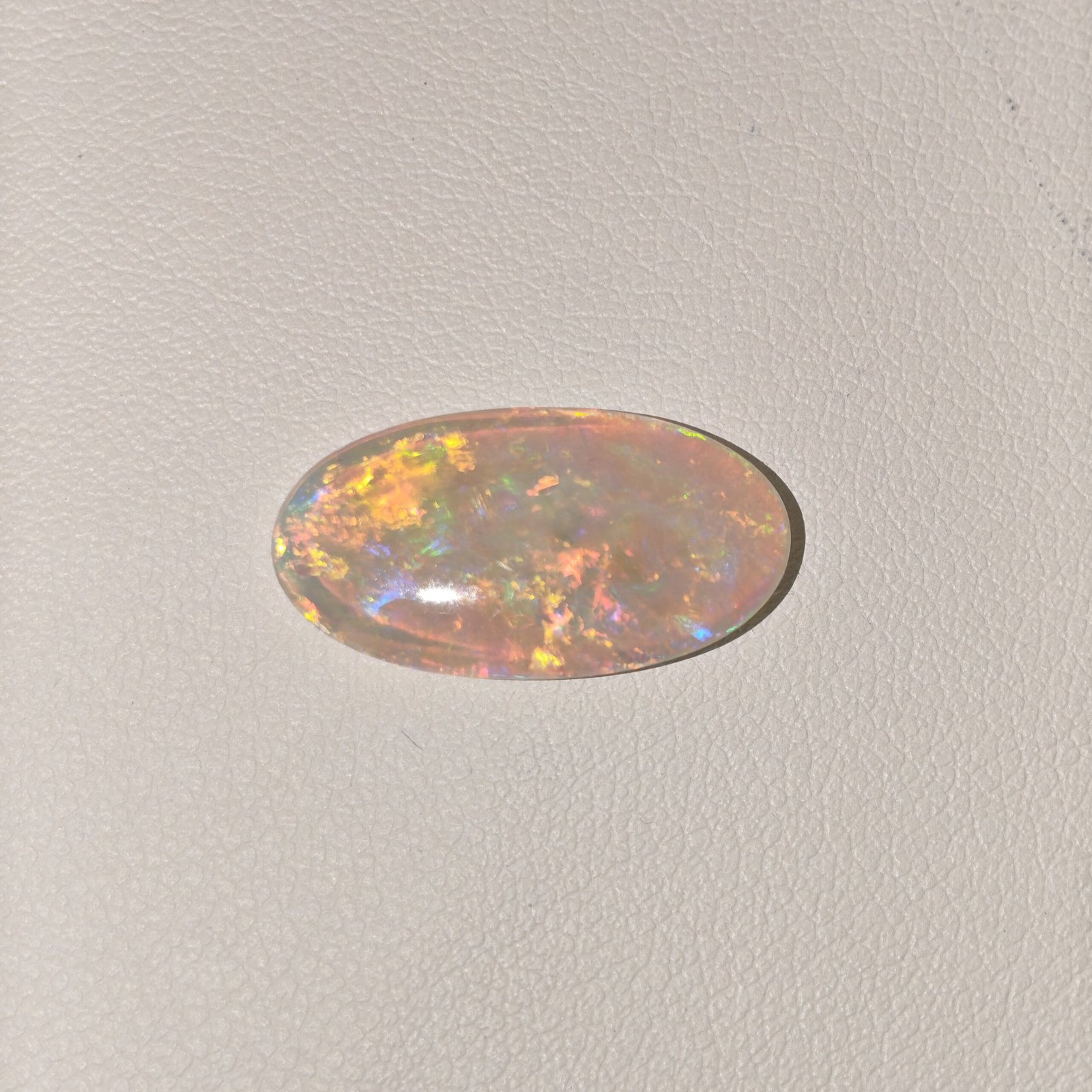 Natural Australian Fire Opal White Oval Cabochon OP-012 Natural Australian Fire Opal white oval cabochon gemstone OP-012 from Australia