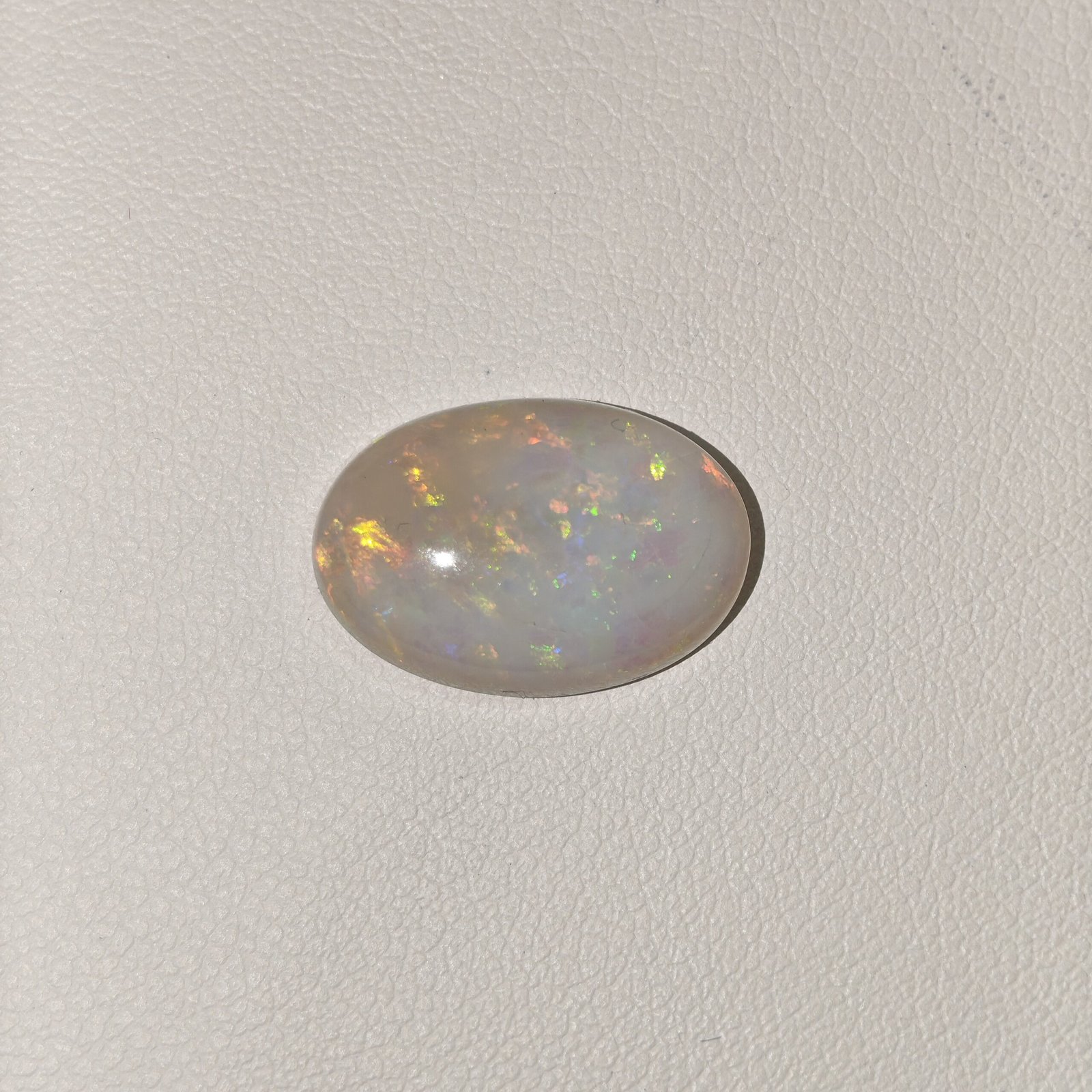 Natural Australian Fire Opal White Oval Cabochon OP-015 Natural Australian Fire Opal white oval cabochon gemstone OP-015 from Australia