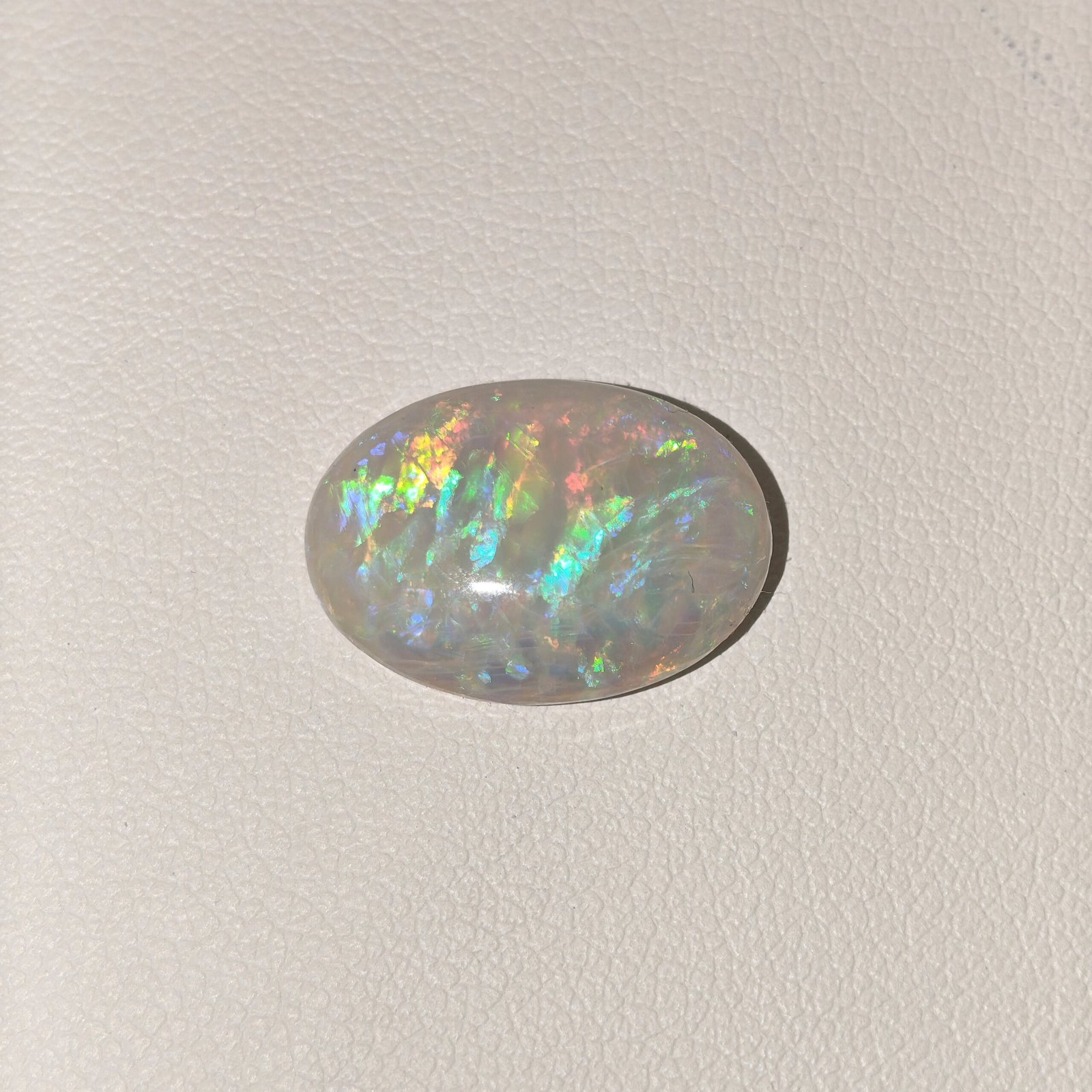 Natural Australian Fire Opal White Oval Cabochon OP-017 Natural Australian Fire Opal white oval cabochon gemstone OP-017 from Australia