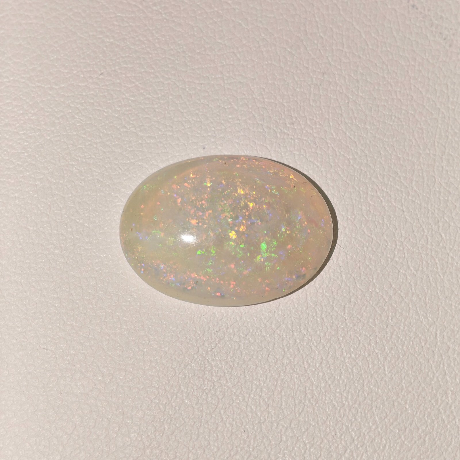 Natural Australian Fire Opal White Oval Cabochon OP-018 Natural Australian Fire Opal white oval cabochon gemstone OP-018 from Australia