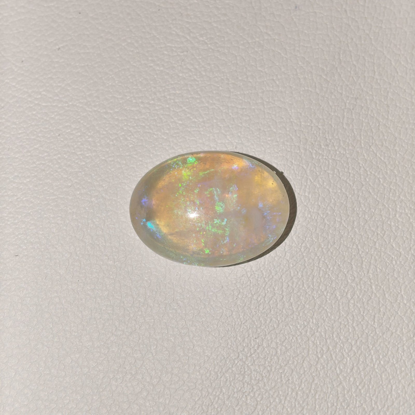 Natural Australian Fire Opal White Oval Cabochon OP-019 Natural Australian Fire Opal white oval cabochon gemstone OP-019 from Australia